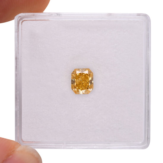0.77 Carat Fancy Intense Orangy Yellow Radiant Diamond SI1 GIA