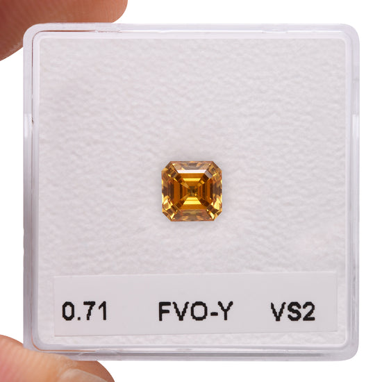 0.71 Carat Fancy Vivid Orangy Yellow Asscher Diamond VS2 GIA