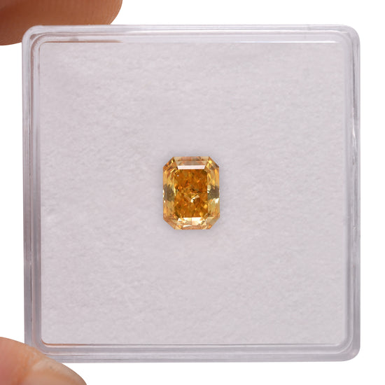 0.84 Carat Fancy Vivid Orange Yellow Radiant Diamond SI1 GIA