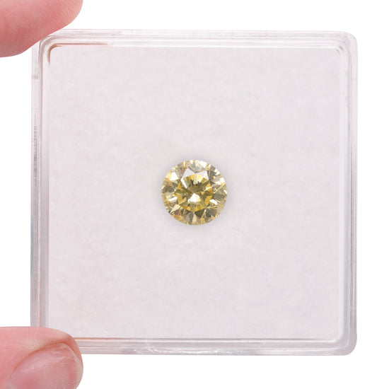 0.69 Carat Fancy Yellow Round Brilliant Diamond SI2 GIA