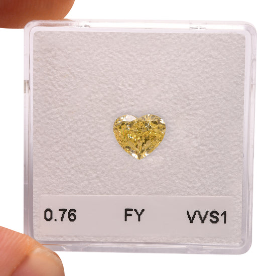 0.76 Carat Fancy Yellow HEART Diamond VVS1 GIA