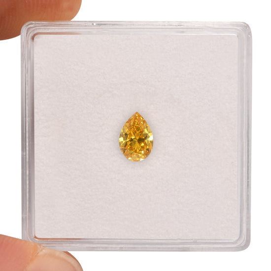 0.50 Carat Fancy Vivid Orangy Yellow Pear Diamond VS1 GIA