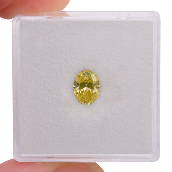0.72 Carat Fancy Intense Greenish Yellow Oval Diamond VVS2 GIA