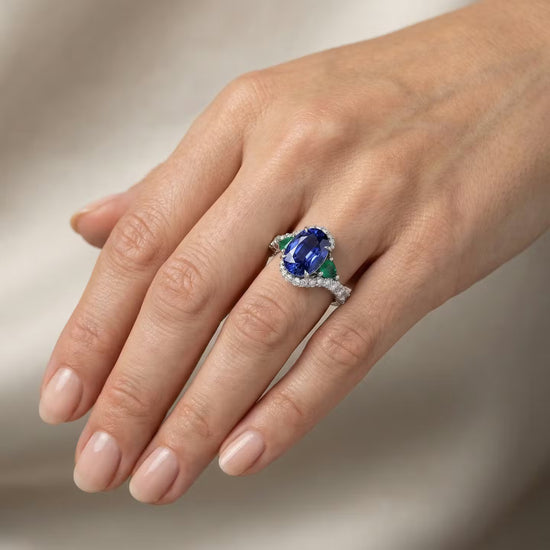 Royal Blue Oval Sapphire, Pear Emeralds, and Diamond Ring