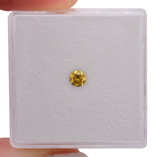 0.15 Carat Fancy Vivid Orangy Yellow Round Brilliant Diamond SI1 GIA