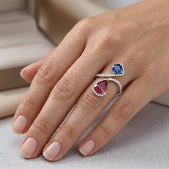 Ruby, Blue Sapphire and Diamond Two-stone Crossover Ring