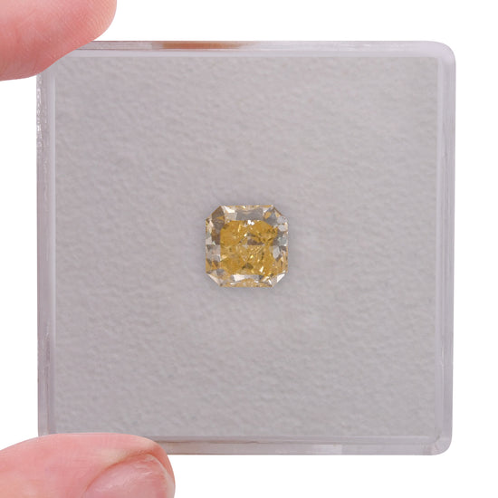 0.81 Carat Fancy Orangy Yellow Radiant Diamond SI2 GIA