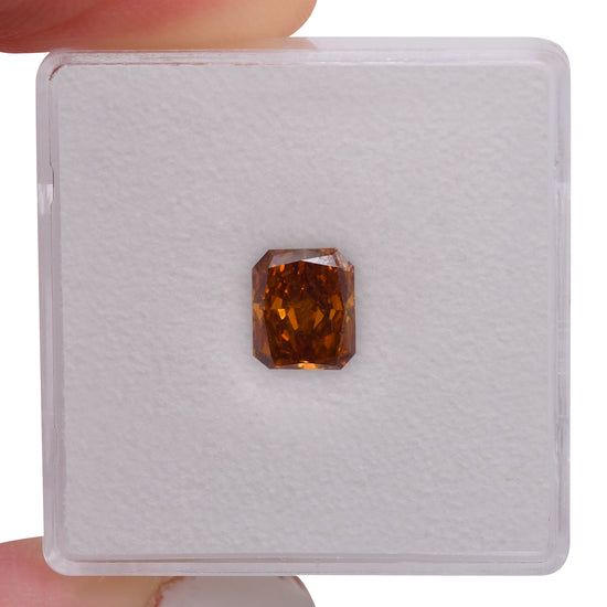 1.10 Karat Fancy Deep Brownish Orange Radiant Diamant SI2 GIA
