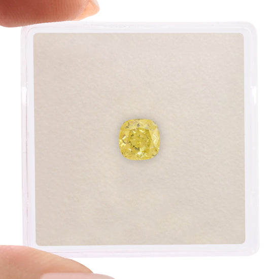 0.64 Carat Fancy Intense Yellow Cushion Diamond VVS1 GIA