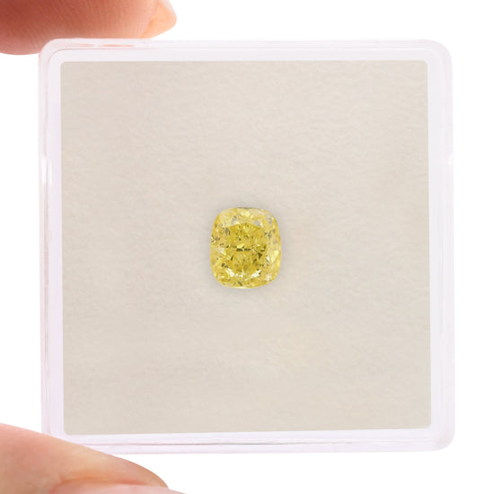 0.68 Carat Fancy Intense Yellow Cushion Diamond VVS2 GIA