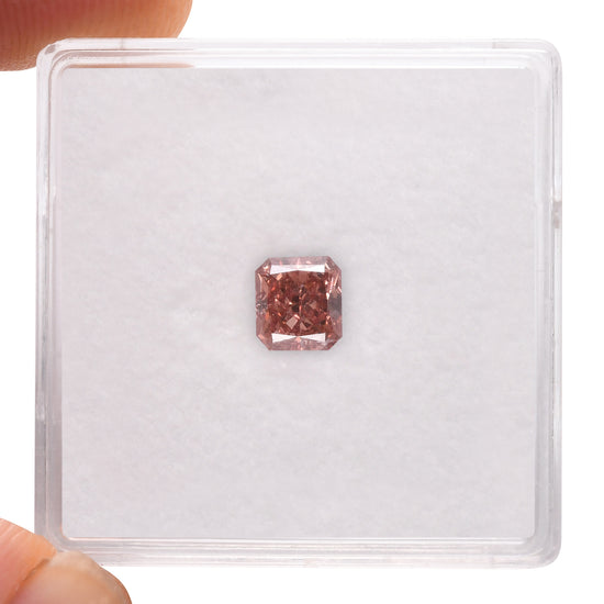 0.61 Carat Fancy Deep Orangy Pink Radiant Diamond SI1 GIA