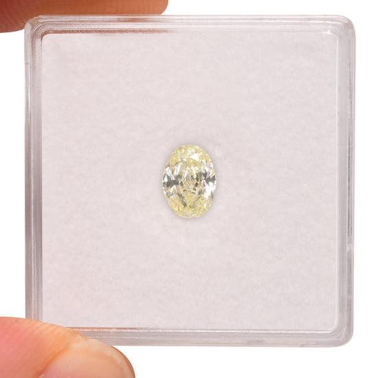 0.64 Carat Fancy Light Green Yellow Oval Diamond (SI1) GIA
