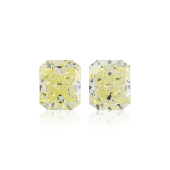 6.08 Carat Fancy Yellow Radiant Diamonds VVS1 GIA Pair