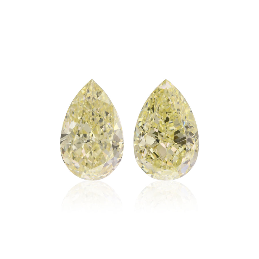 6.22 Carat Light Yellow Pear Diamonds VS2 and VS1 GIA Pair