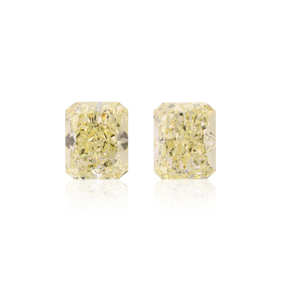 6.60 Carat Fancy Yellow Radiant Diamonds VVS2 and VVS GIA Pair