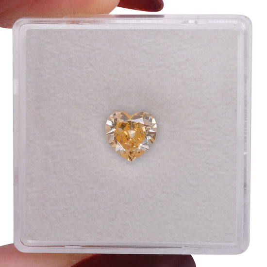 0.81 Carat Fancy Yellow Orange HEART Diamond SI2 GIA