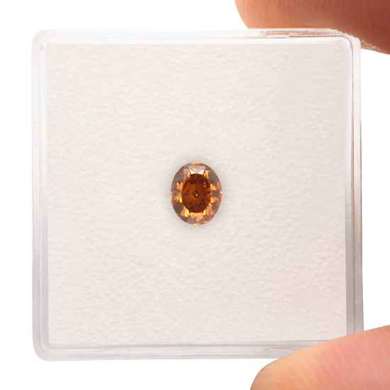 0.56 Carat Fancy Deep Yellowish Orange Oval Diamond SI1 GIA