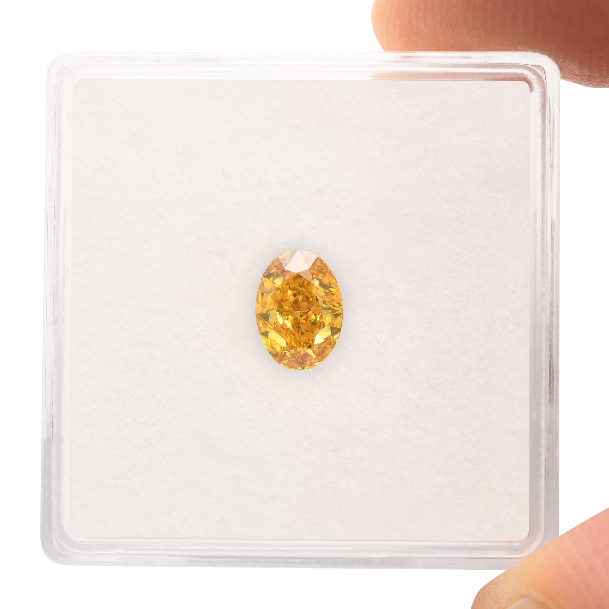 0.70 Carat Fancy Vivid Orangy Yellow Oval Diamond VS2 GIA | LEIBISH
