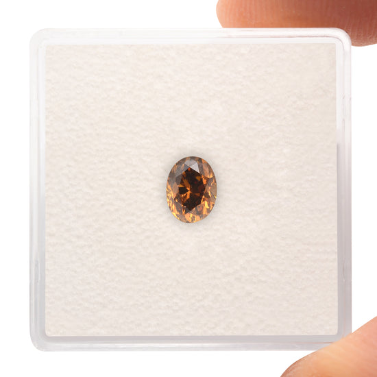 0.70 Carat Fancy Dark Orangy Brown Oval Diamond I1 GIA
