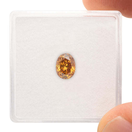 0.74 Carat Fancy Deep Orange Yellow Oval Diamond I1 GIA