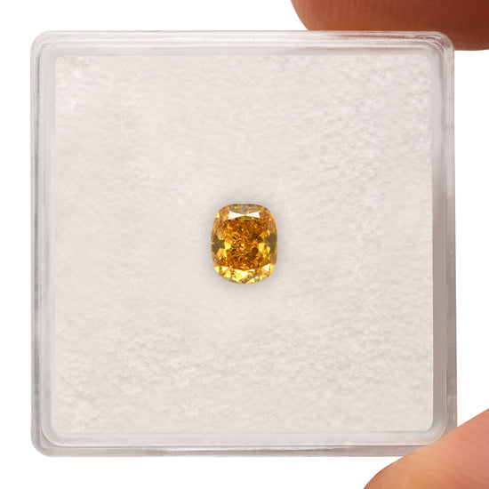 0.55 Carat Fancy Vivid Orangy Yellow Cushion Diamond SI1 GIA