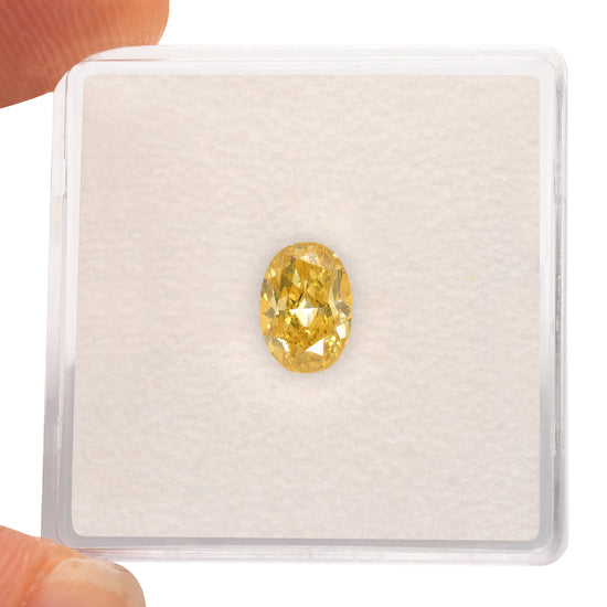 0.92 Carat Fancy Vivid Yellow Oval Diamond VS2 GIA