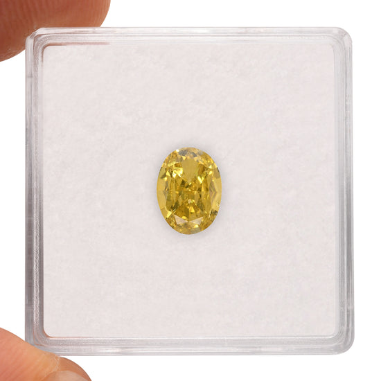 0.70 Carat Fancy Vivid Yellow Oval Diamond SI2 GIA