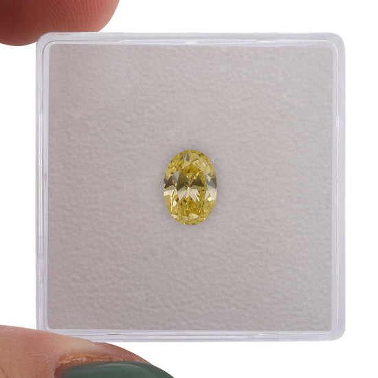 0.71 Carat Fancy Intense Yellow Oval Diamond (SI2) GIA