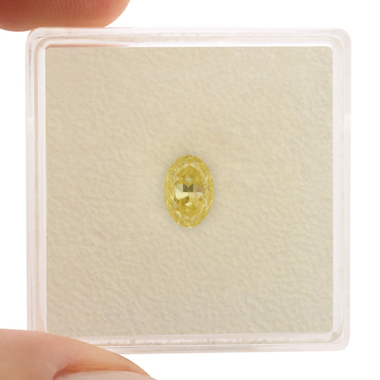 0.65 Carat Fancy Yellow Oval Diamond IF GIA