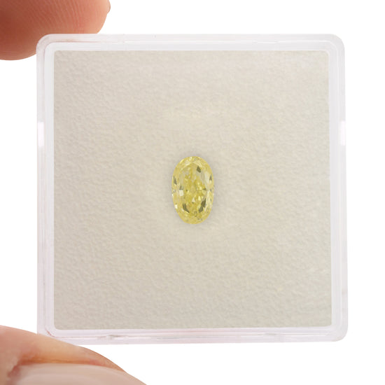 0.55 Carat Fancy Yellow Oval Diamond IF GIA
