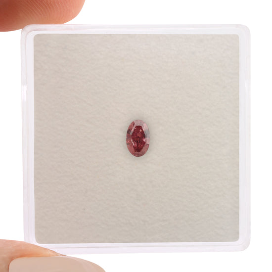 0.20 Carat Fancy Vivid Pink Oval Diamond VS2 GIA