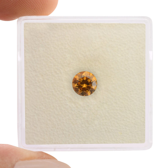 0.54 Carat Fancy Deep Yellow Orange Round Brilliant Diamond SI2 GIA