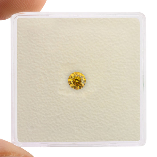 0,20 Karat Fancy Vivid Orangy Yellow Round Brilliant Diamant VVS1 GIA