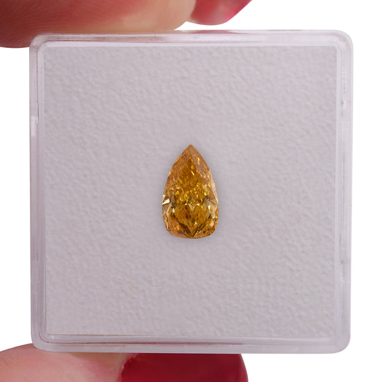 0.79 Carat Fancy Vivid Yellow Orange Pear Diamond VS2 GIA