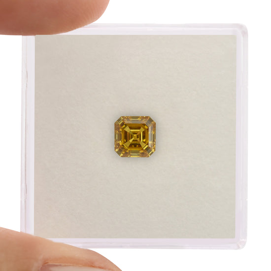 0.83 Carat Fancy Deep Orangy Yellow Asscher Diamond VS1 GIA