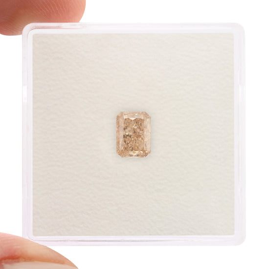 0.70 Carat Fancy Pink Brown Radiant Diamond VVS1 GIA