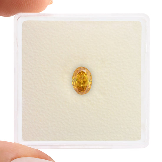 0.55 Carat Fancy Vivid Orange Yellow Oval Diamond VS2 GIA