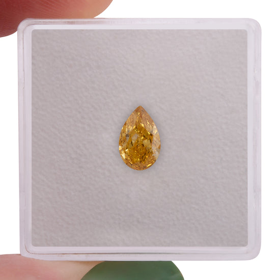 0.70 Carat Fancy Vivid Orange Yellow Pear Diamond VS2 GIA