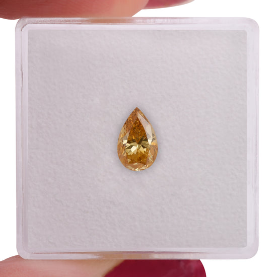 0.70 Carat Fancy Vivid Orange Yellow Pear Diamond SI2 GIA