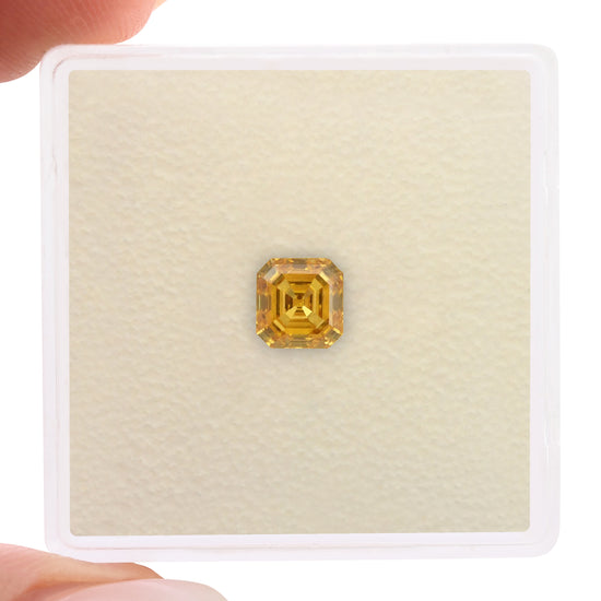 0.73 Carat Fancy Vivid Orange Yellow Asscher Diamond VS1 GIA