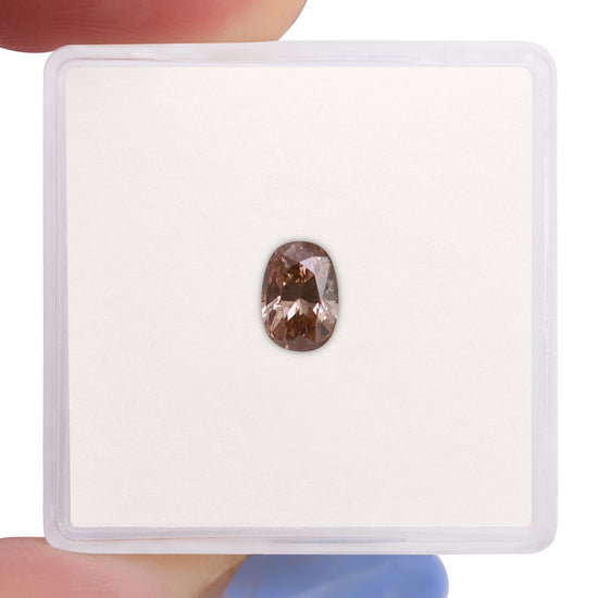 0.53 Carat Fancy Orange Brown Oval Diamond SI2 GIA