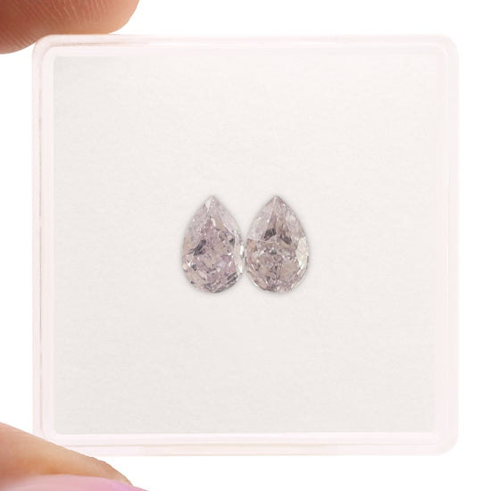 0.91 Carat Fancy Light Pinkish Purple Pear Diamonds SI1