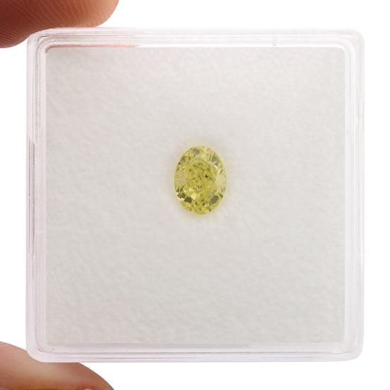 0.57 Carat Fancy Intense Yellow Oval Diamond VS2 GIA