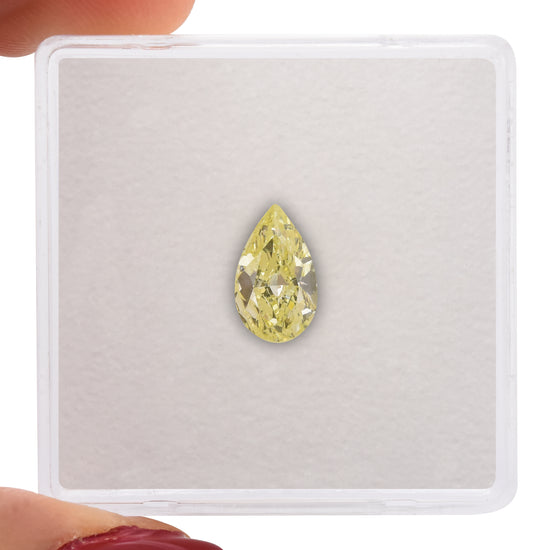 0.70 Carat Light Green Yellow Pear Diamond VS1 GIA
