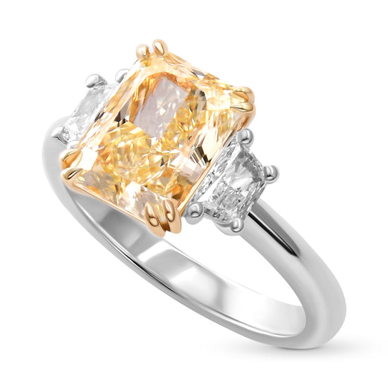 Light Yellow Y-Z Radiant Three-stone Diamond Ring