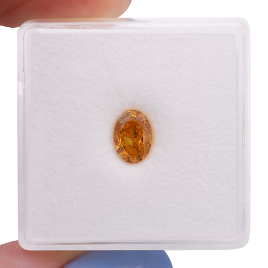 0.84 Carat Fancy Vivid Yellowish Orange Oval Diamond VS2 GIA