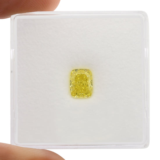 0.80 Carat Fancy Vivid Yellow Cushion Diamond VVS1 GIA