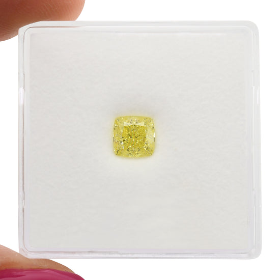 0.71 Carat Fancy Yellow Cushion Diamond VVS1 GIA