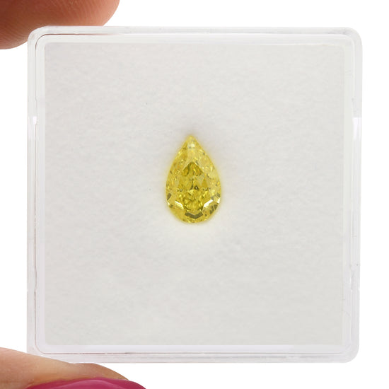 0.71 Carat Fancy Vivid Yellow Pear Diamond VS1 GIA