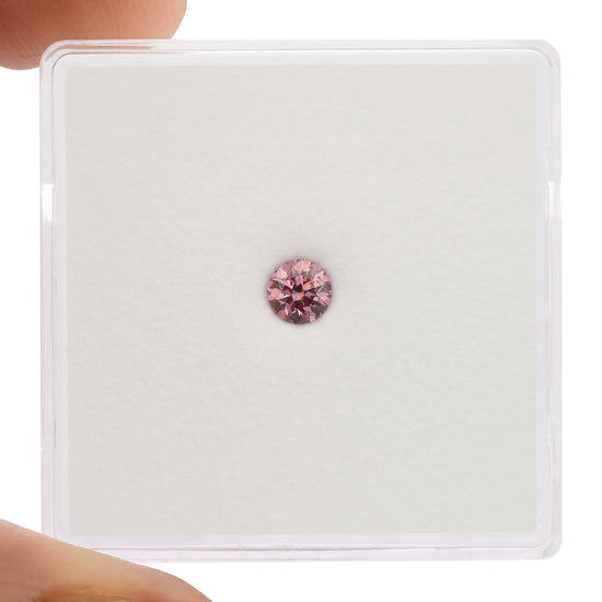 0.16 Carat Fancy Vivid Purplish Pink Round Brilliant Argyle Diamond SI2 GIA